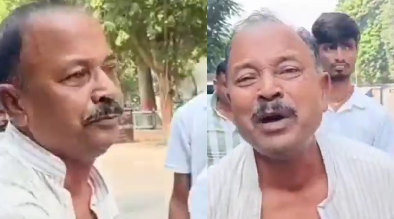 RJD worker protests outside Lalu-Rabri residence, alleging irregularity in ticket distribution.